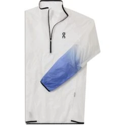 On Running On Zero Jacket Hardloopjack - Undyed-White & Cobalt 22 On Running On Zero Jacket Hardloopjack - Undyed-White & Cobalt -On Running Winkel on zero jacket undyed white cobalt 9 1443277